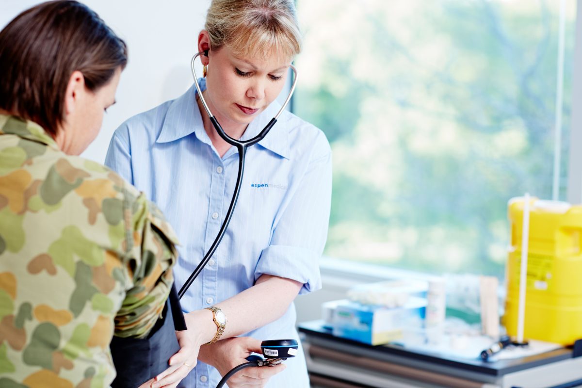 Doctor with army member