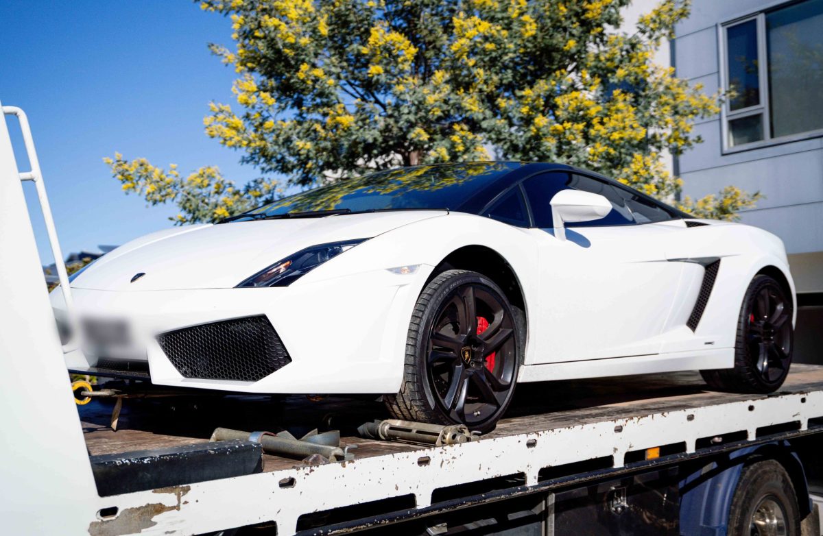 Lamborghini on a flatbed tow truck