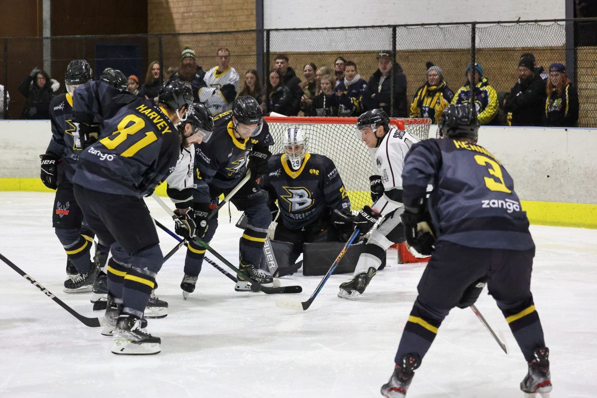 Ice hockey players battle it out