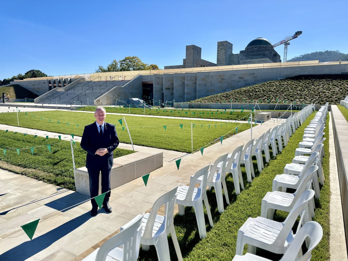 man standing in front of the War Memorial