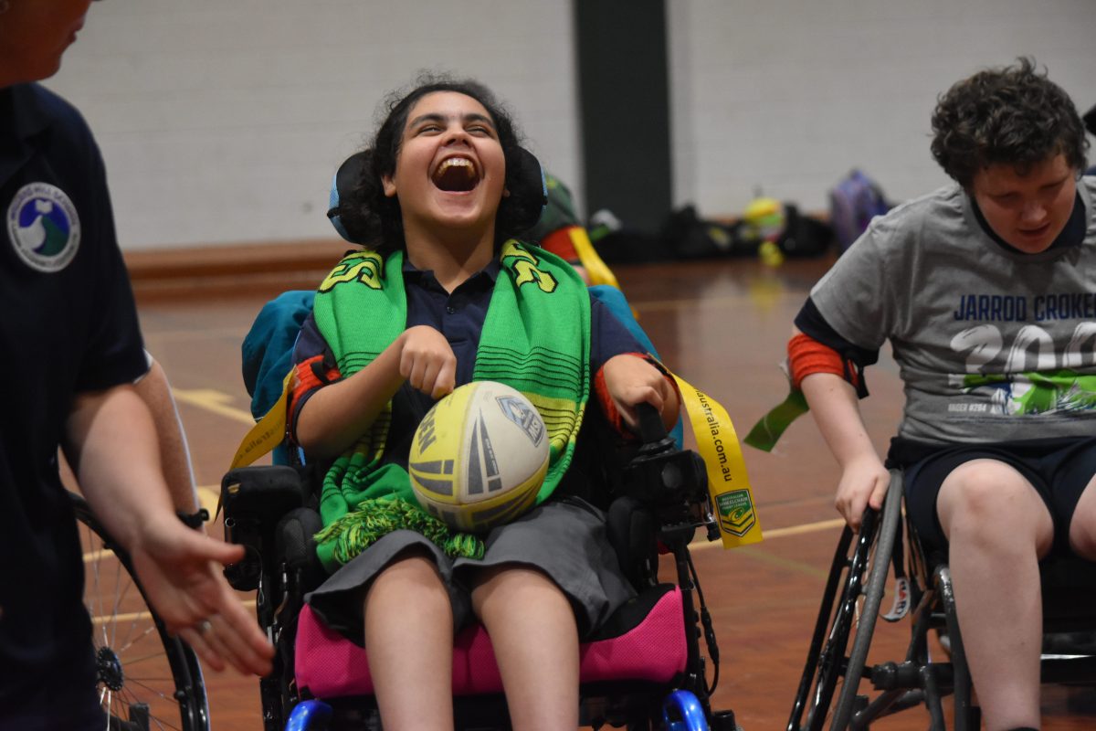 woman in wheelchair playing league