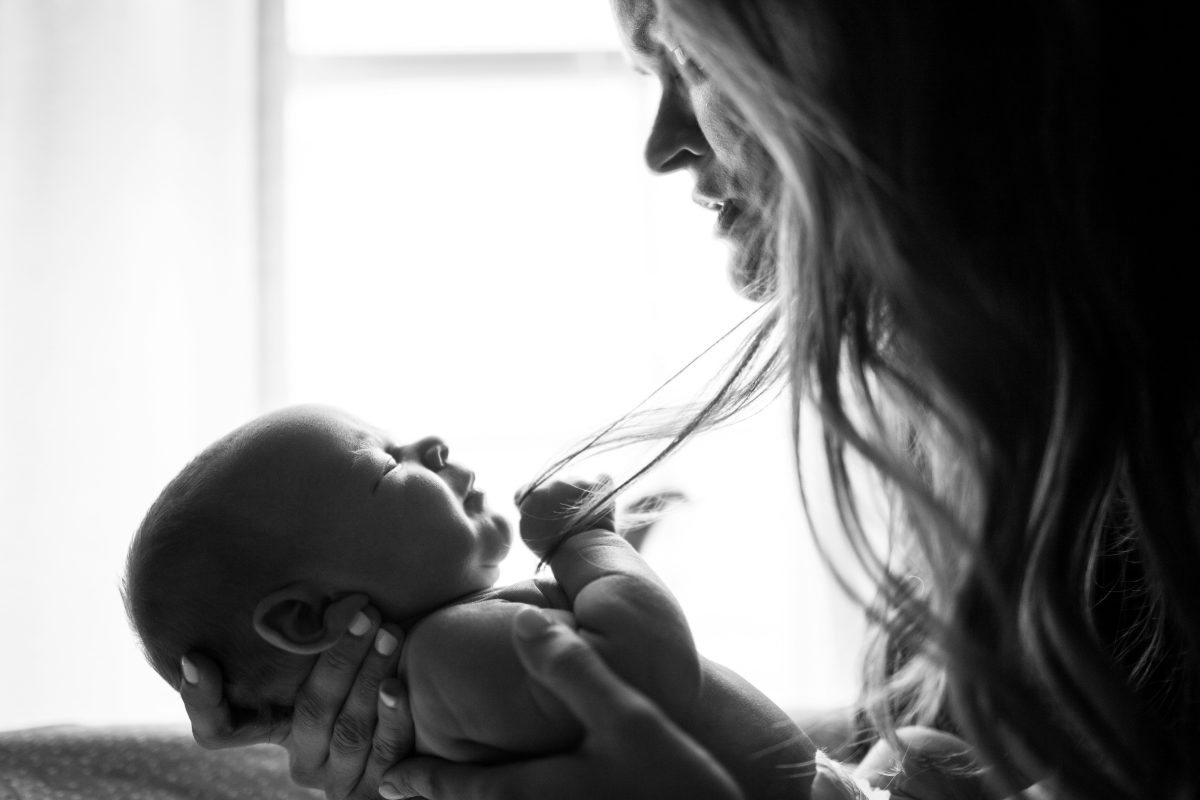 Mother holding her newborn