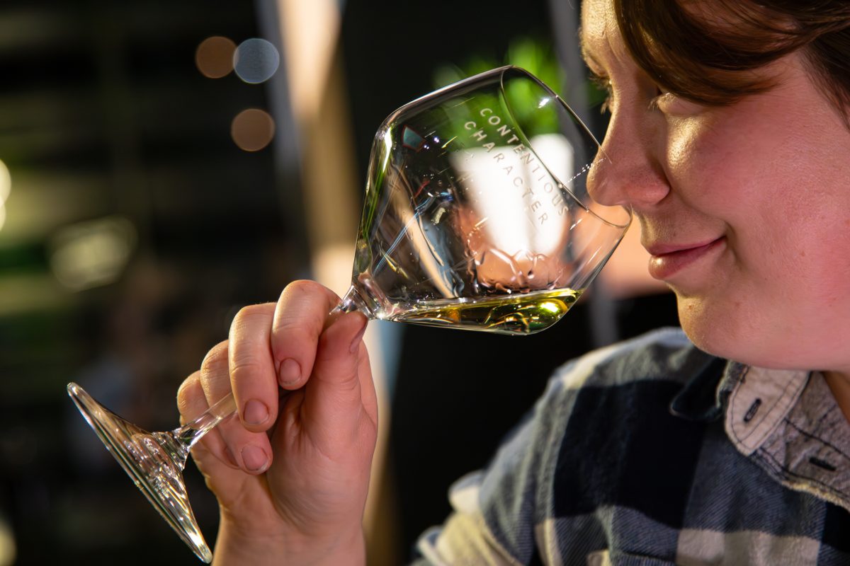woman sniffing wine