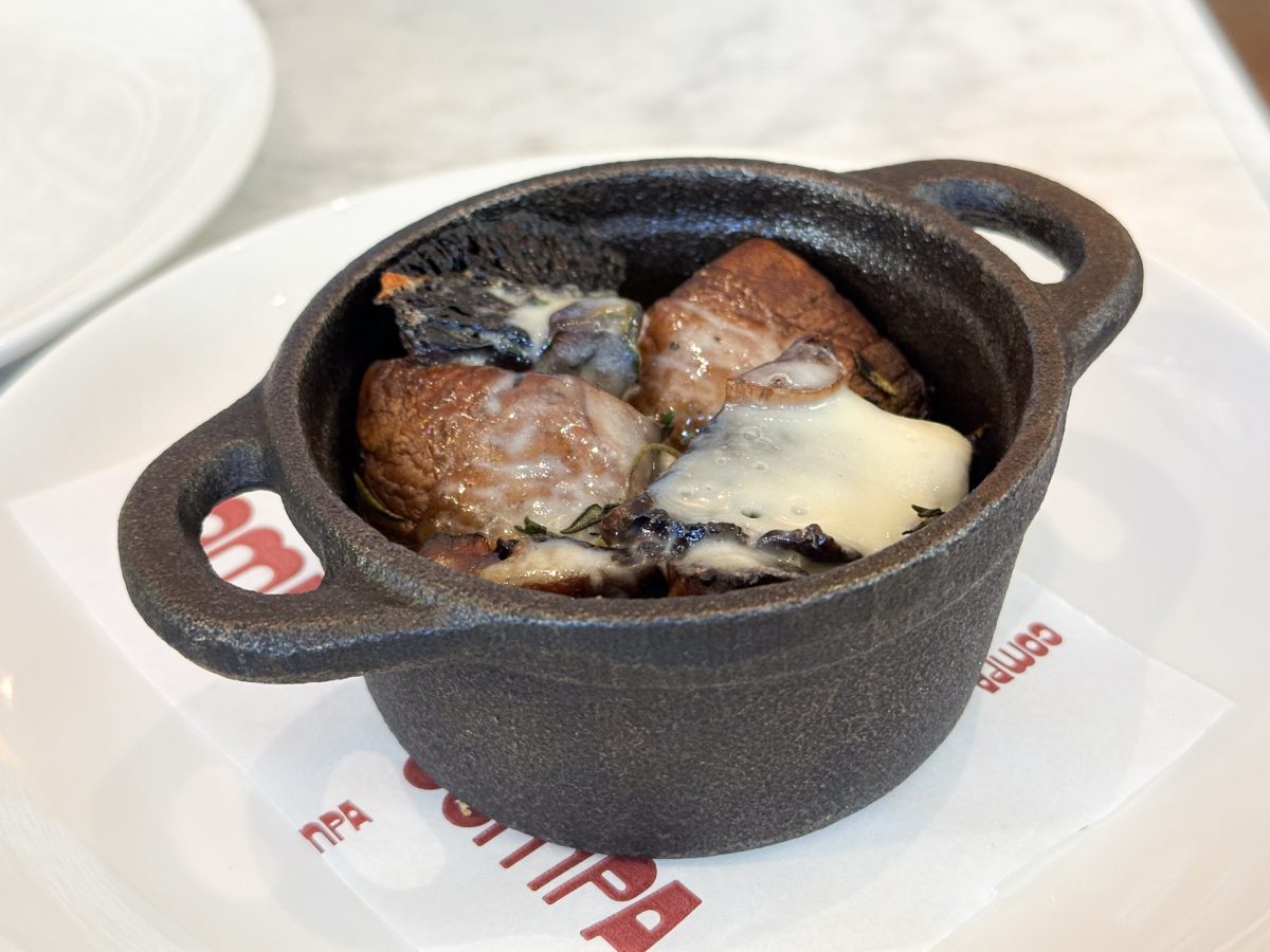 Mushrooms in small stoneware dish.