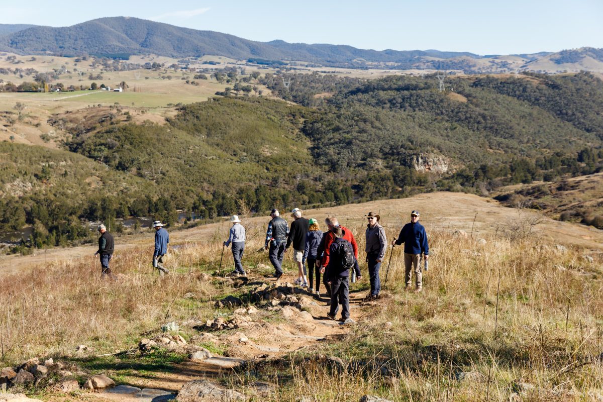 People walk along new Ginninderry walking track