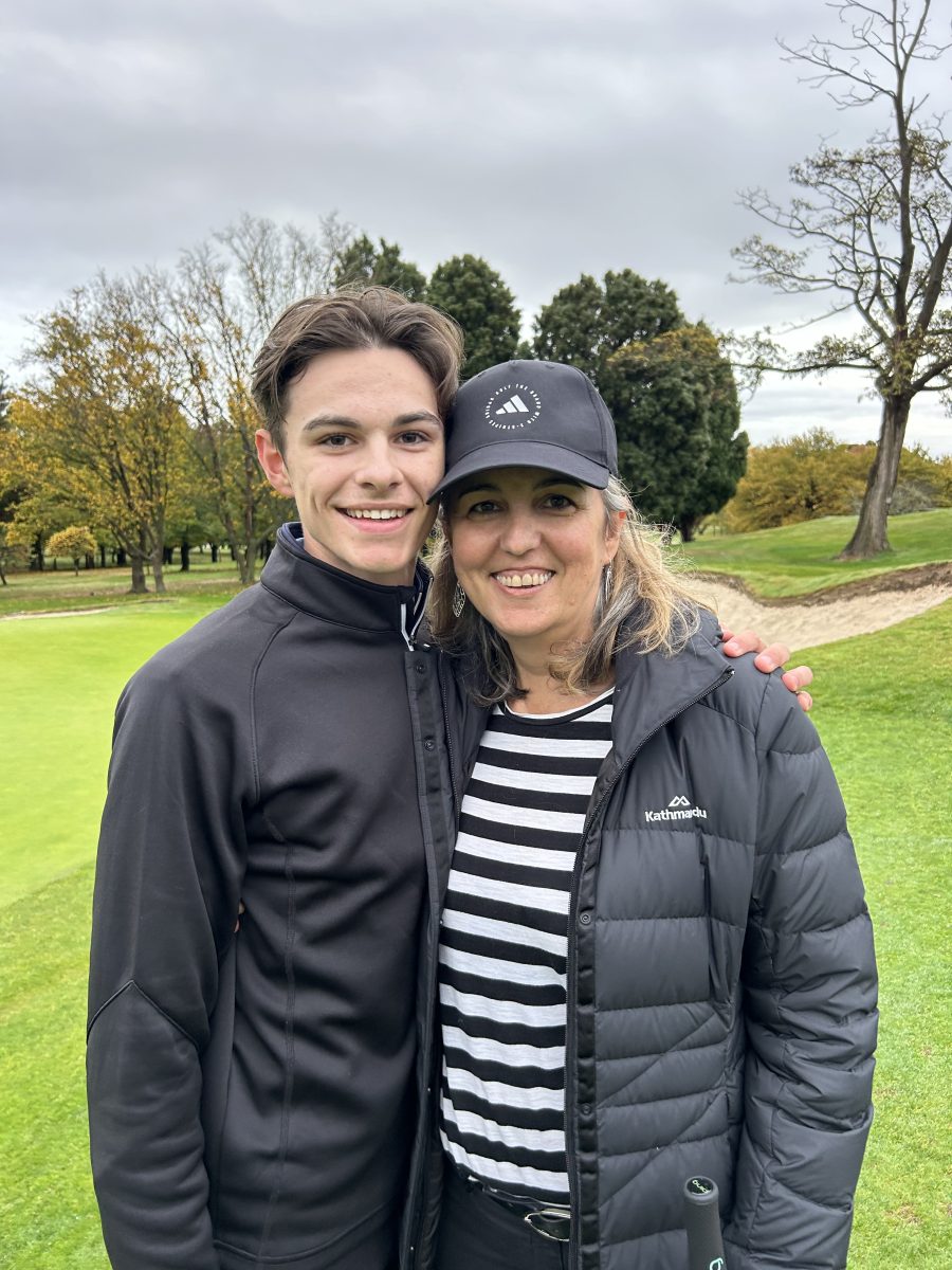 mum and son on golf course