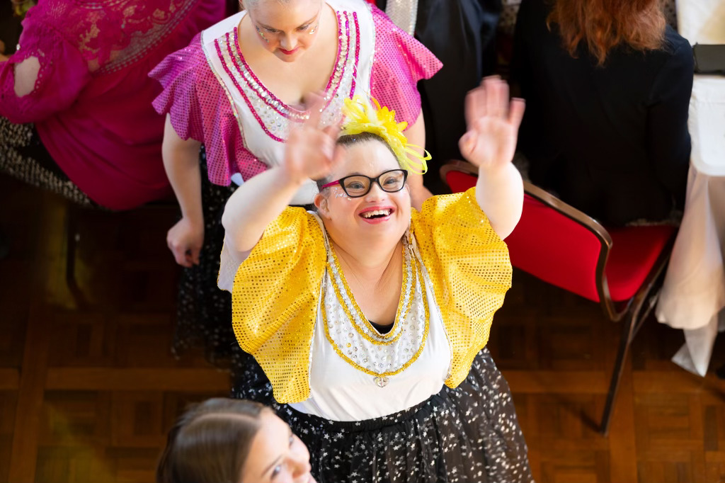 Haylee with down syndrome smiling during dance