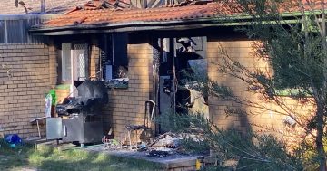 Man charged with murder after Holt house fire