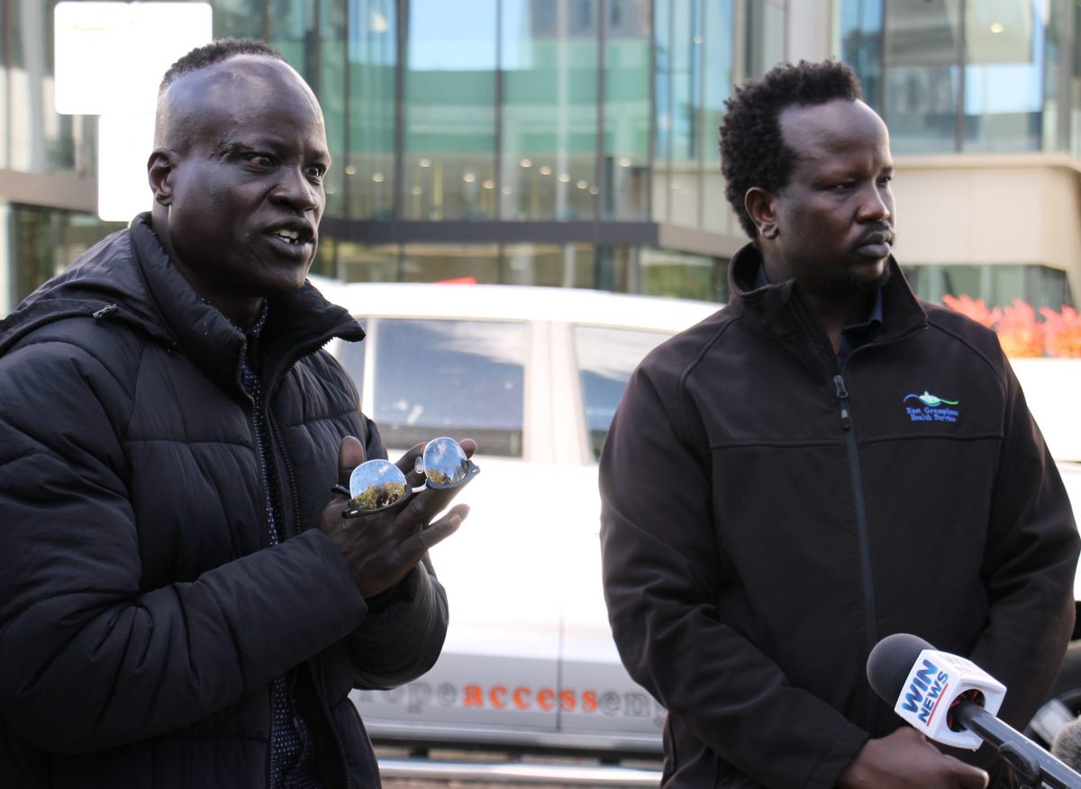 two men at a press conference