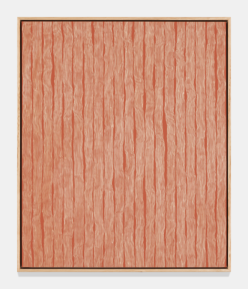 Carved reddish wooden panel
