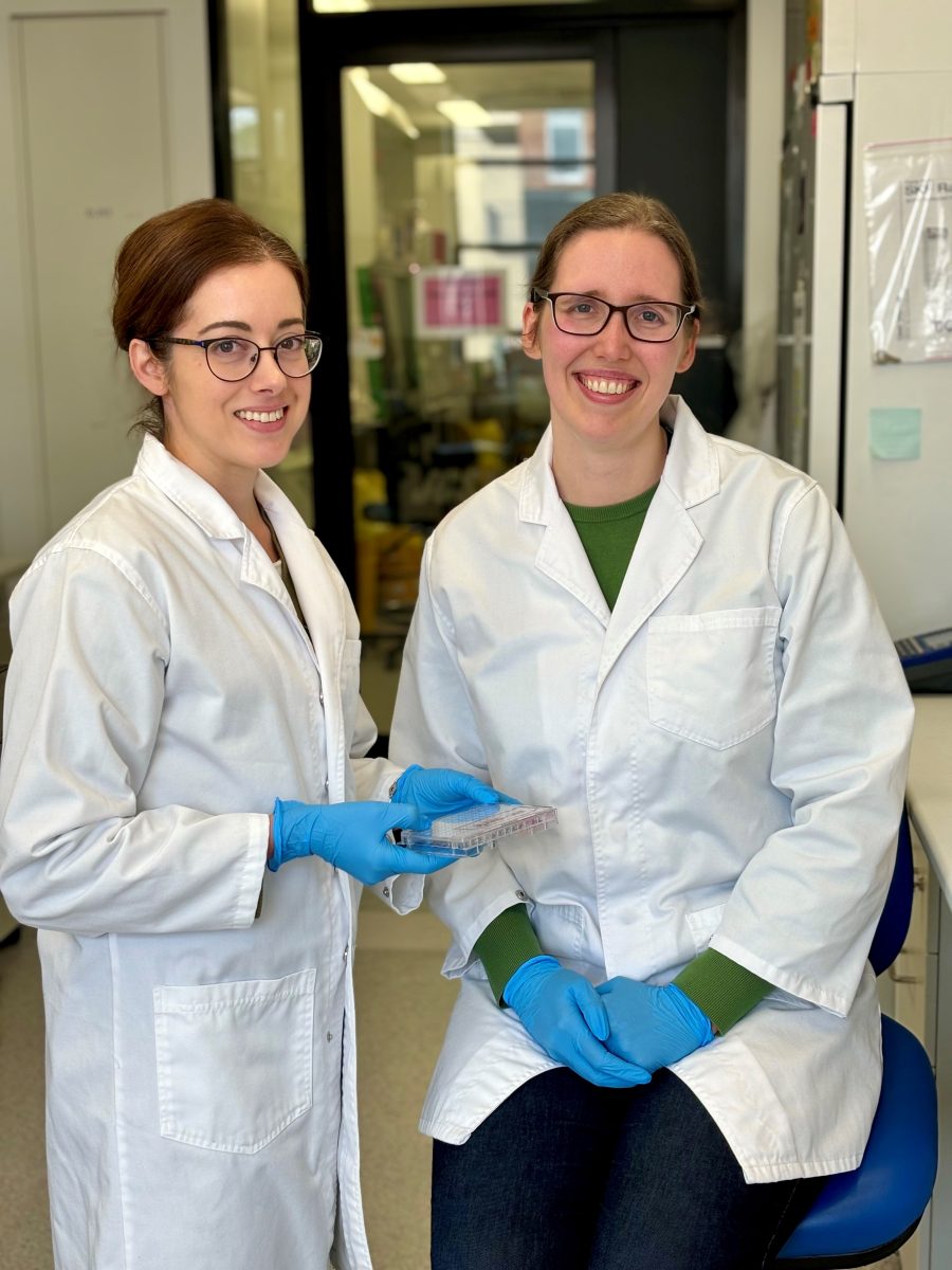 Dr Teresa Bonello and Dr Rachel Woodhouse in white lab coats