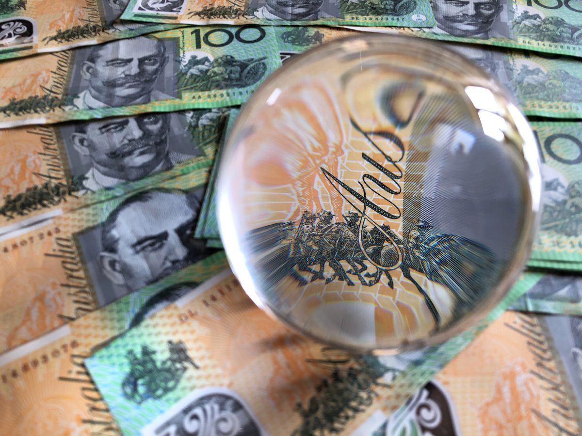Australia banknotes and a crystal ball