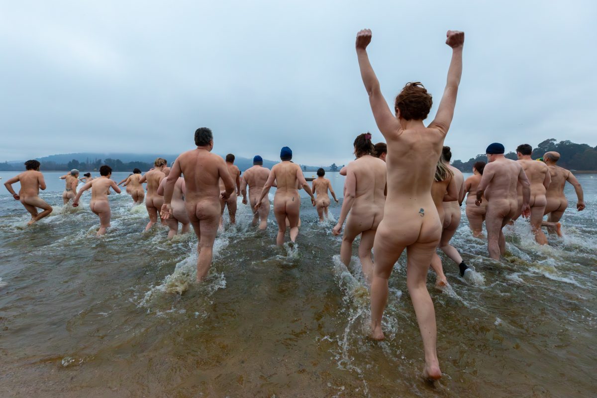 nude swimmers entering Lake Burley Griffin