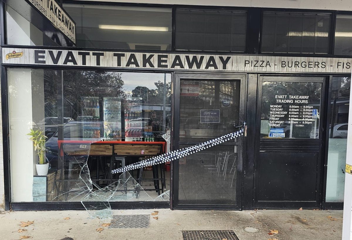 broken window at a takeaway shop