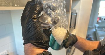 Alleged drugs, car and cash seized and woman arrested after raid of Gungahlin property