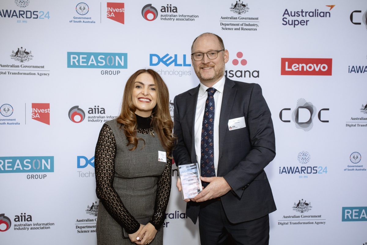 Rachel Gately and Tim McLaren receiving the 2024 iAwards