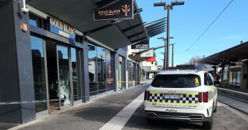 WATCH: Offender sets themself alight during arson attack on Gungahlin barber shop