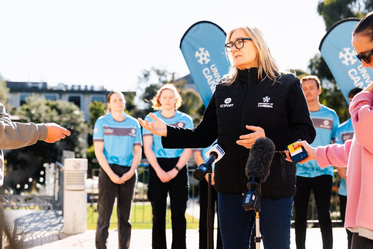 Person speaking at a media event