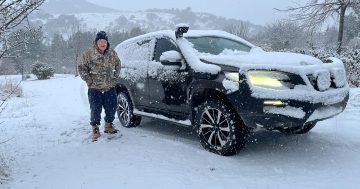 Better late than never, parts of Canberra receive a white Christmas in July