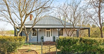 Gorgeous 1912 cottage ready to welcome new owners into peaceful heart of Harden