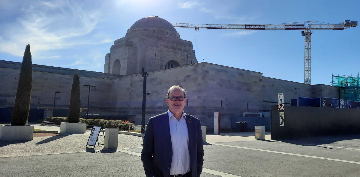 man standing outside the Australian War Memorial