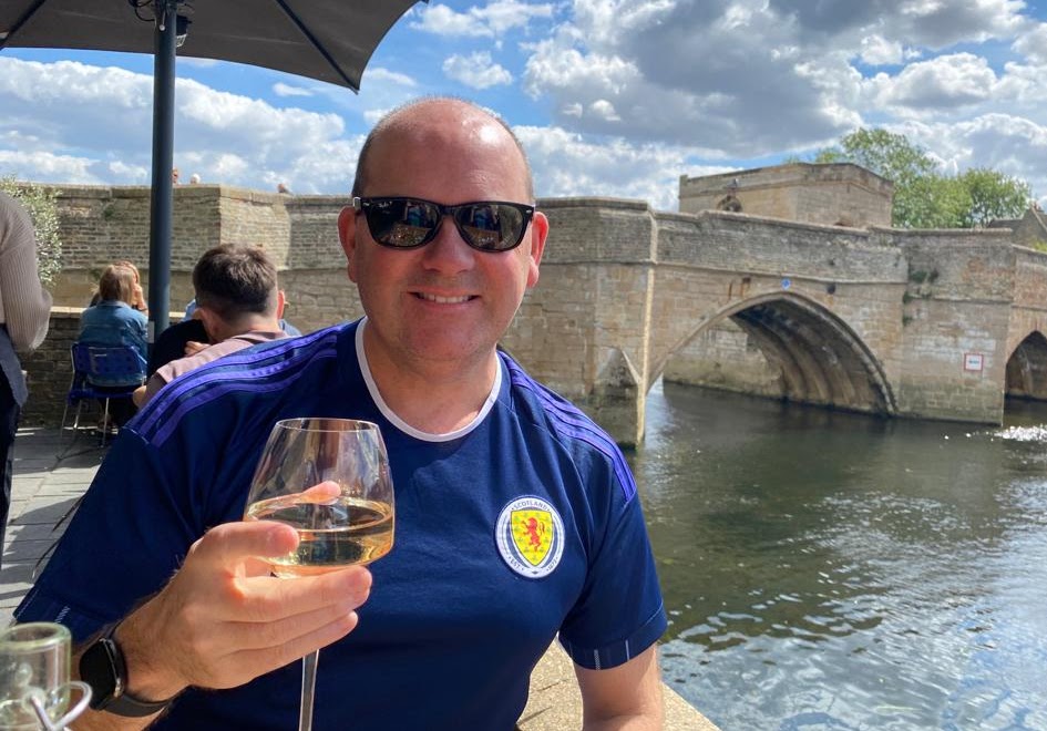 Stuart enjoying a tipple on holiday in the UK in 2023. I've learned there's an even better life without the booze.