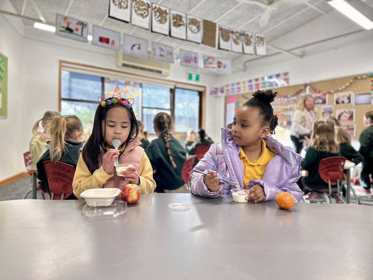 children eating in classroom