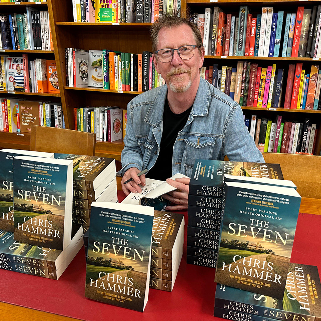 Man signing books