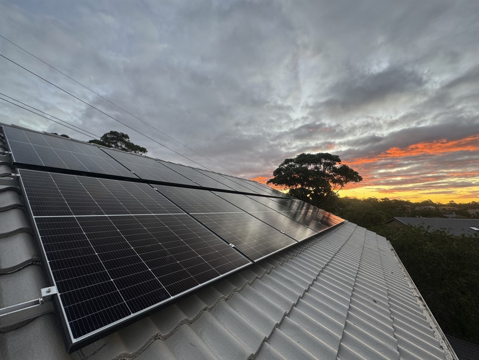 Solar on roof during a sunset.