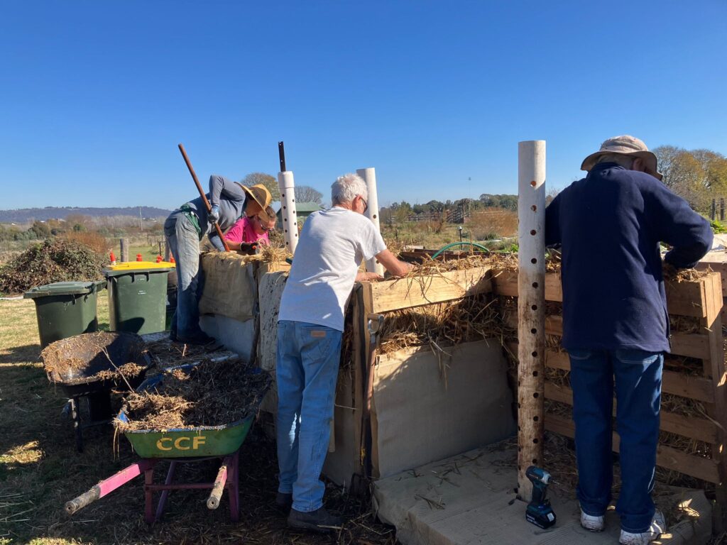 Canbera City Farm volunteers composting