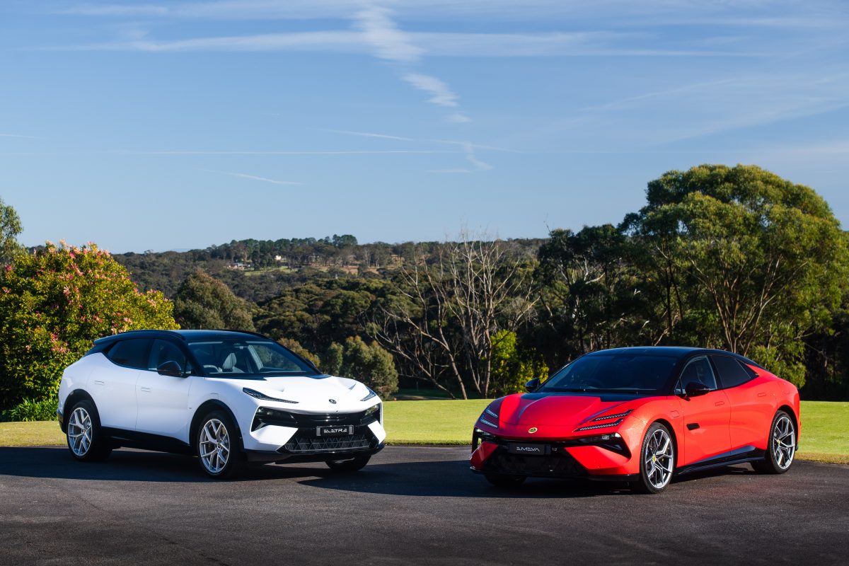 White SUV and red sports car