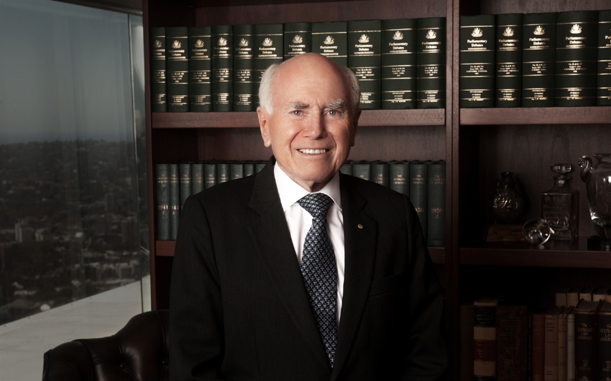 John Howard in a library