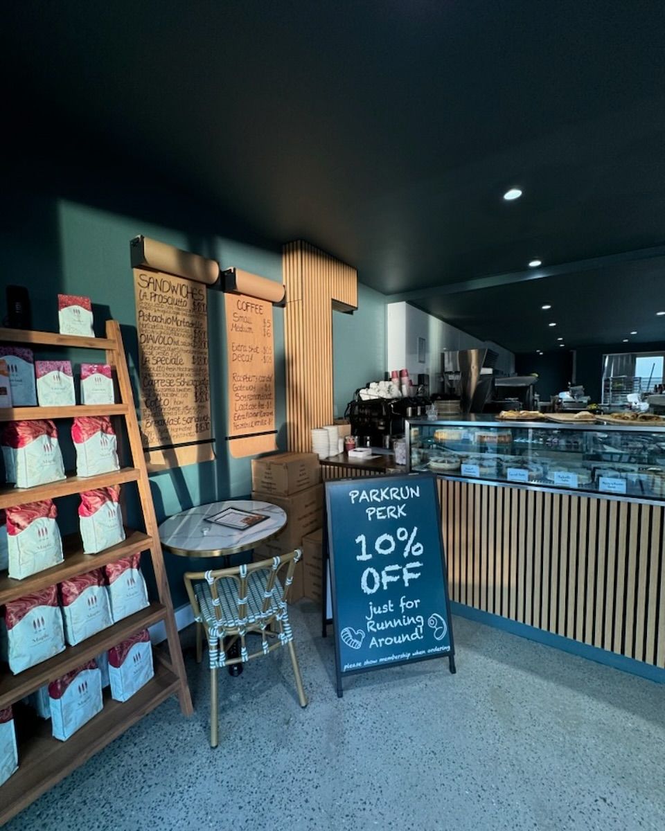 Sign reading 'park run 10% off' in cafe