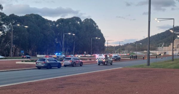 Man dies after falling from moving vehicle on Anzac Parade