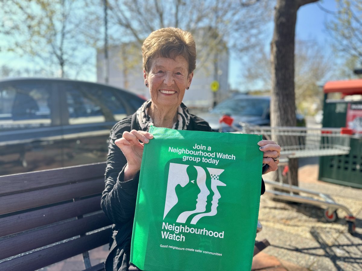 Lady holding green bag