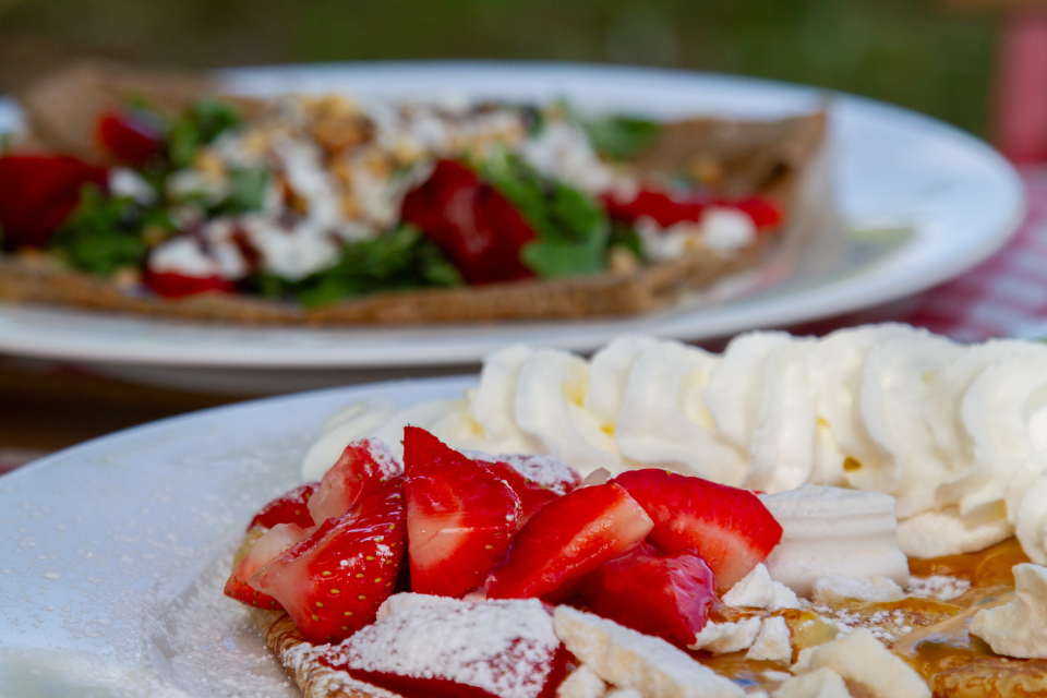 Strawberries and cream, a classic dish at Le Petit Breton Crepes.