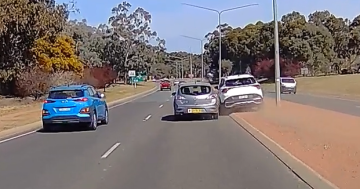 WATCH: Driver of stolen car nearly causes crashes while allegedly fleeing police