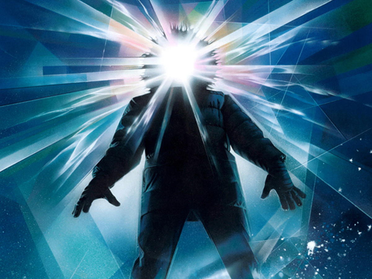 Stylised promotional image from The Thing showing the figure of a person with light coming from their face