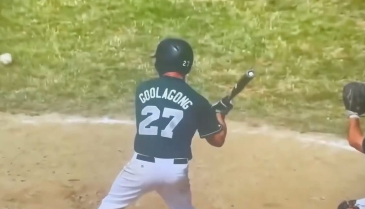 vintage photo of Jeff Googalong playing softball