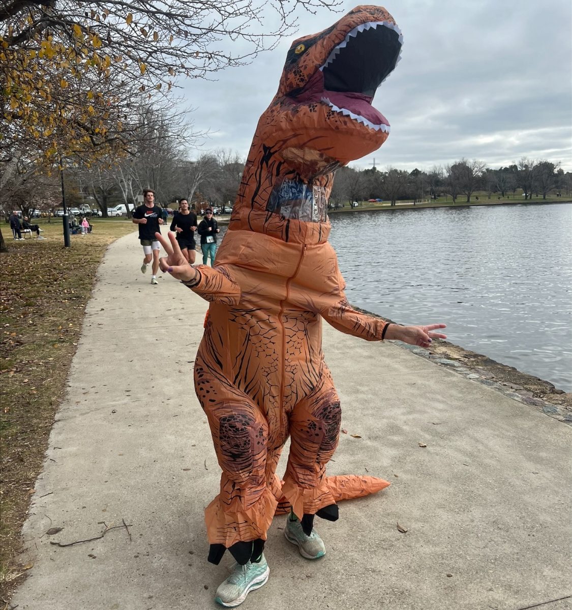 Woman in a dino suit