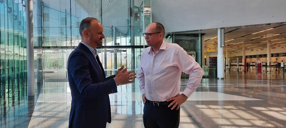 Chief Minister Andrew Barr talks with Canberra Airport Head of Aviation Michael Thomson 