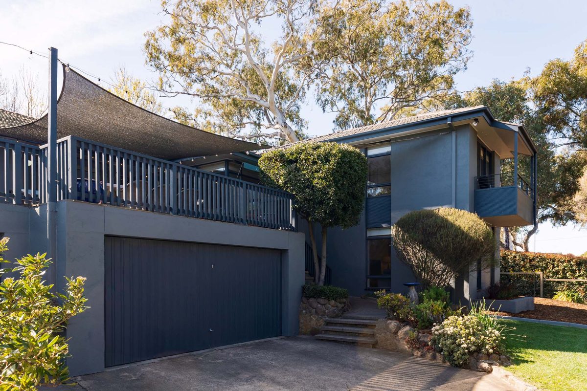 Blue-painted house in Hughes