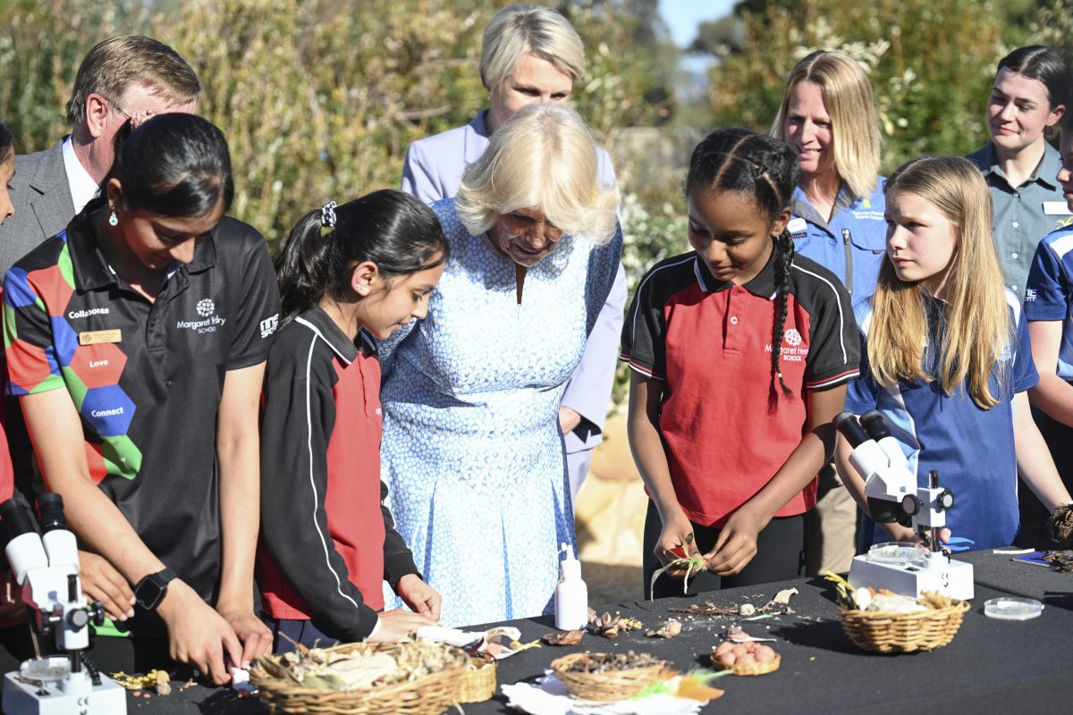 Queen Camilla with school students.