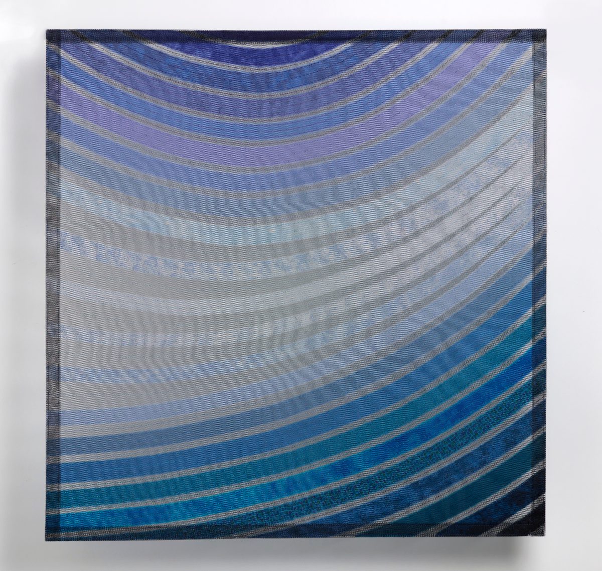 Squarish blue-white panel with curved stripes