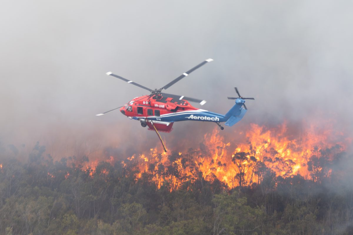 helicopter combatting a bushfire