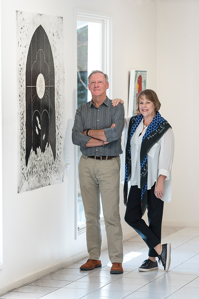 Vertical format of a man and a woman both standing