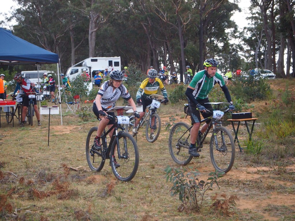 People riding mountain bikes