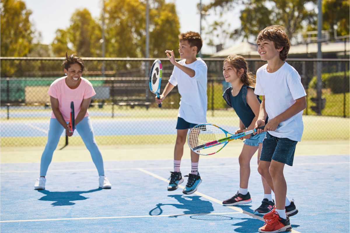 Kids playing tennis