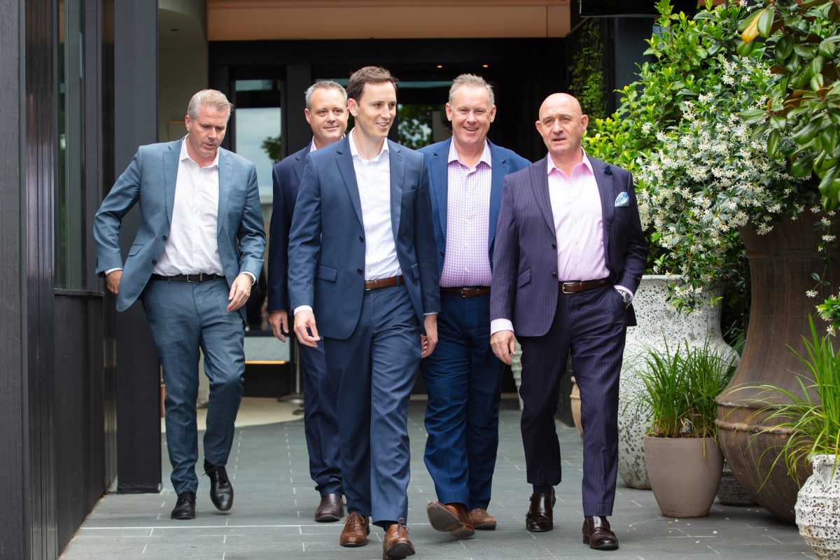 Five Independent Property Group directors walking as a group