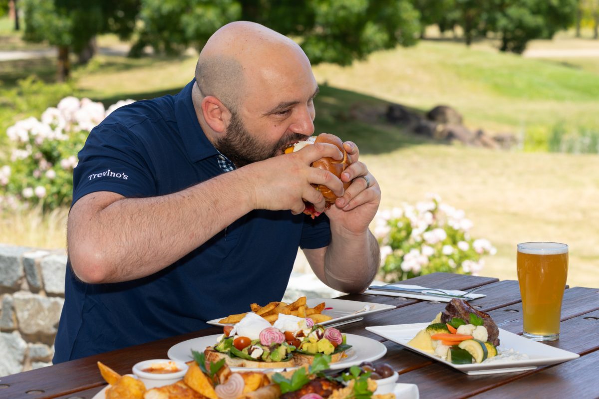 Man eating burger